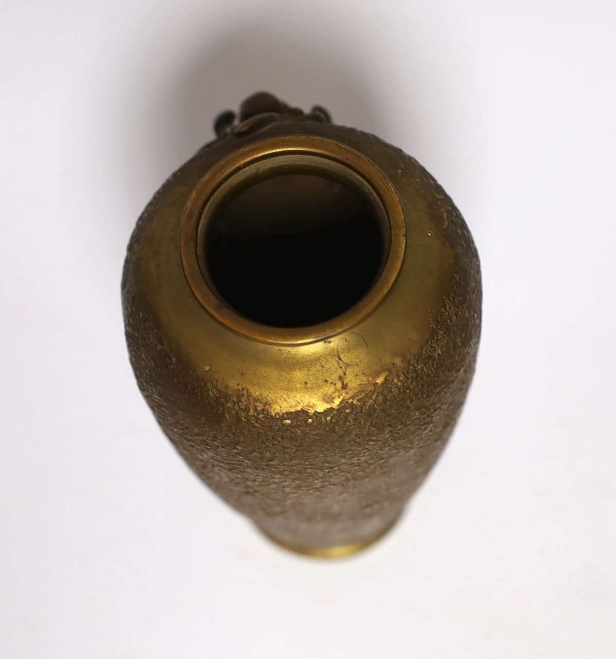 A Japanese bronze vase, with applied lily decoration, 17cm high